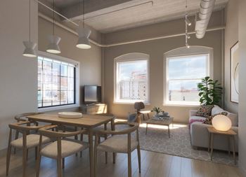 A rendering of a living room and dining room with a table and chairs